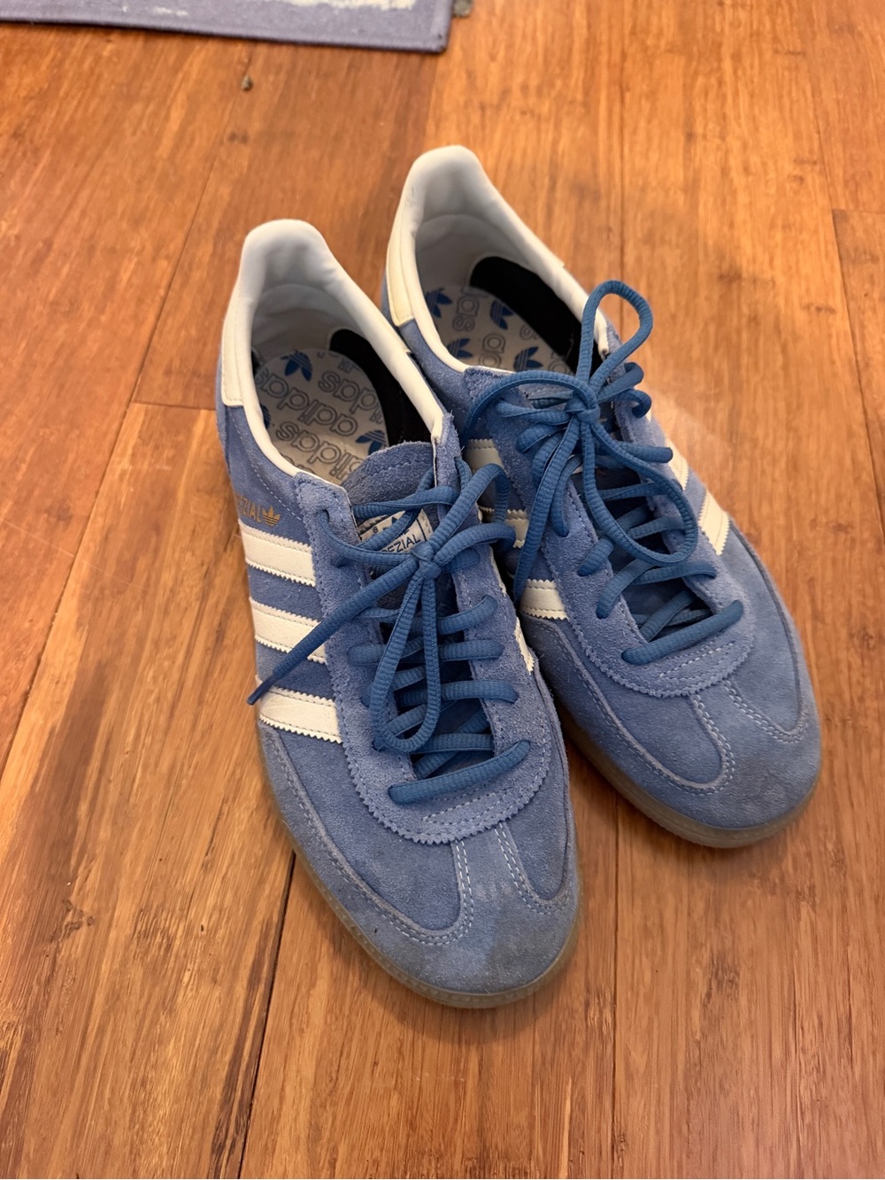 Adidas Originals women’s Blue Suede Samba Sneakers